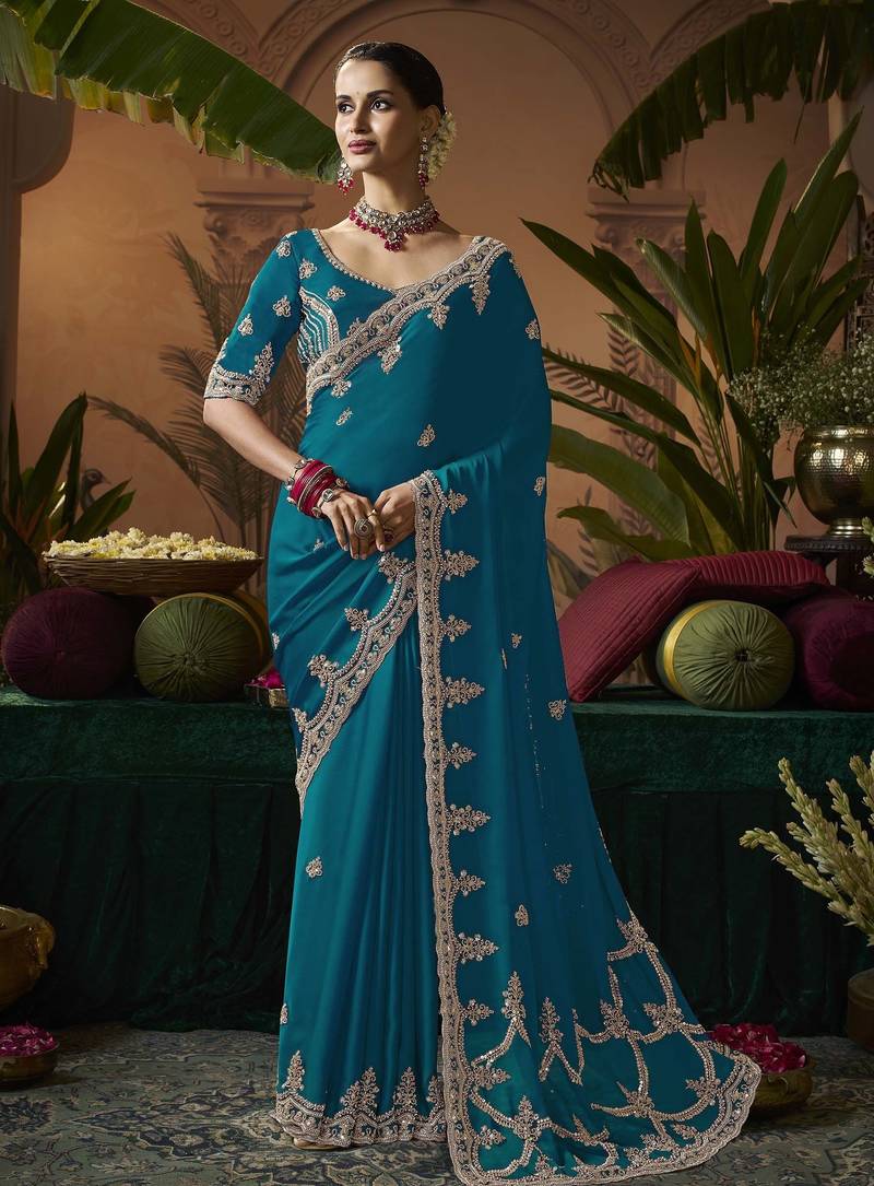 Designer green satin fabric saree with green satin blouse fabric