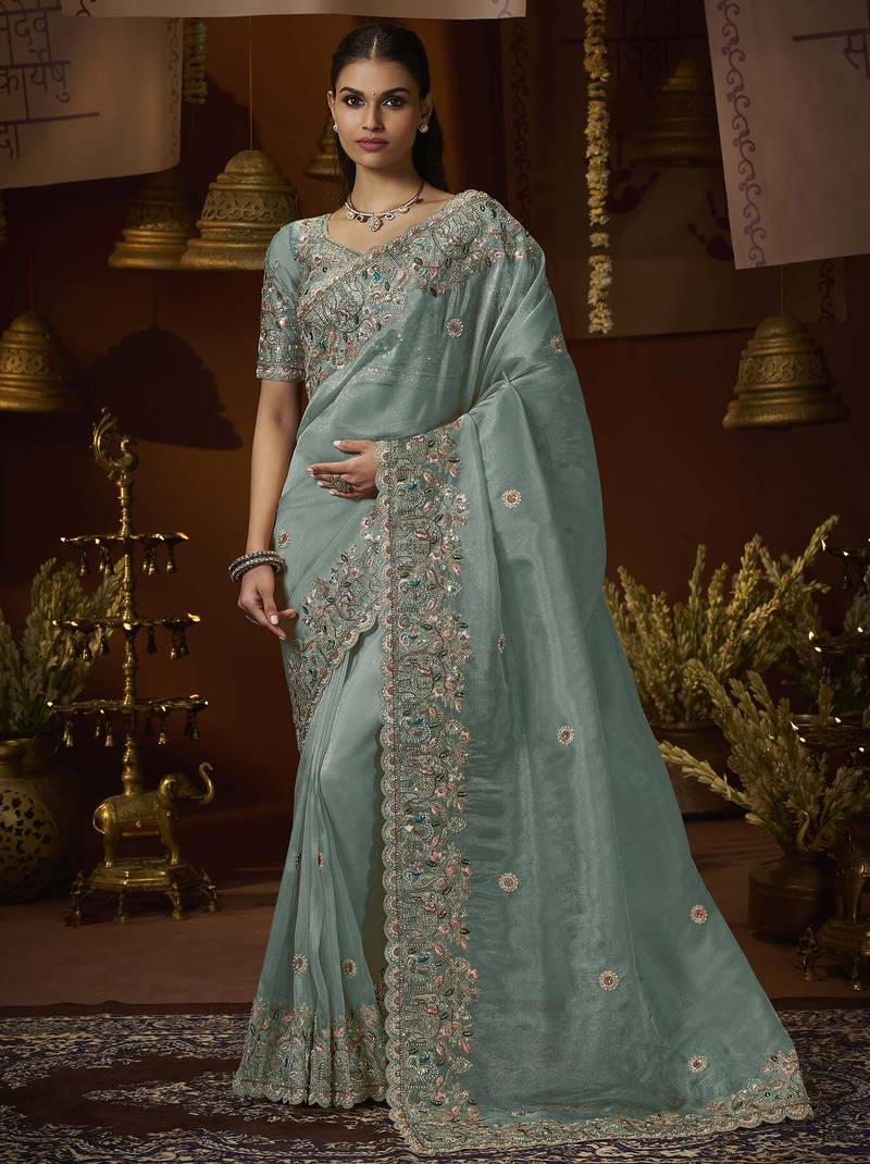 Designer green tissue fabric saree with green tissue blouse fabric