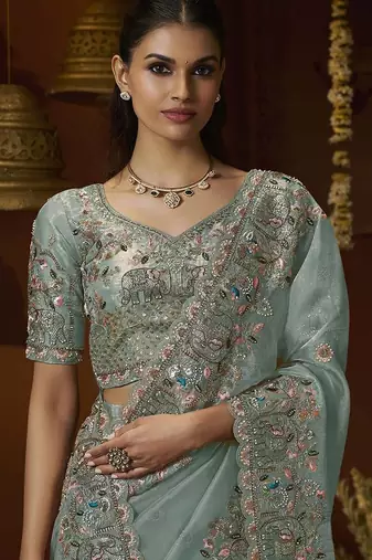 Designer green tissue fabric saree with green tissue blouse fabric