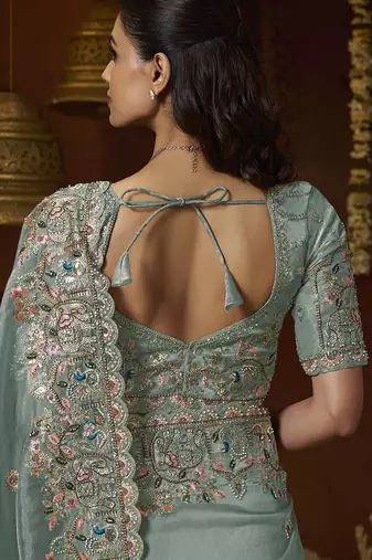 Designer green tissue fabric saree with green tissue blouse fabric