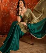Green tissue satin embellished saree with unstitched blouse piece.