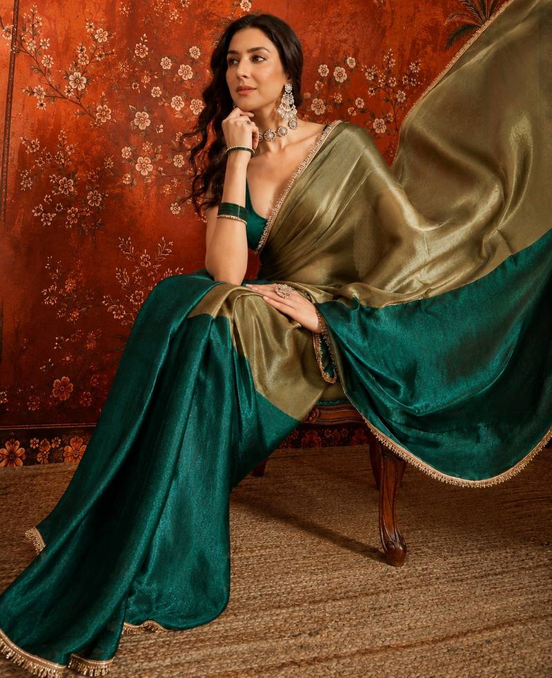 Green tissue satin embellished saree with unstitched blouse piece.