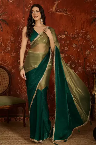 Green tissue satin embellished saree with unstitched blouse piece.