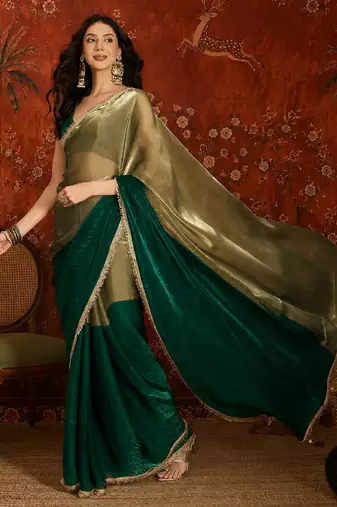Green tissue satin embellished saree with unstitched blouse piece.