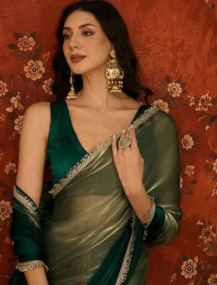 Green tissue satin embellished saree with unstitched blouse piece. 4