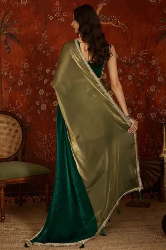 Green tissue satin embellished saree with unstitched blouse piece.
