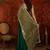 Green tissue satin embellished saree with unstitched blouse piece.