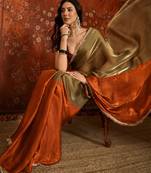 Orange tissue satin embellished saree with unstitched blouse piece.