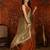 Orange tissue satin embellished saree with unstitched blouse piece.