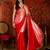 Red tissue satin embellished saree with unstitched blouse piece.