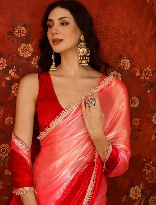 Red tissue satin embellished saree with unstitched blouse piece. 5