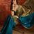 Teal tissue satin embellished saree with unstitched blouse piece.