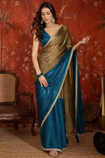 Teal tissue satin embellished saree with unstitched blouse piece.