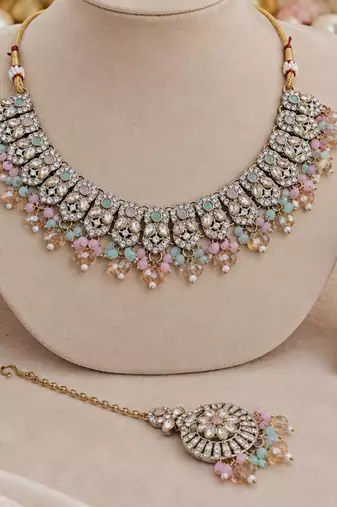 Pink pista mehandi-plated agate stone necklace set with earrings & maang tikka