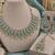 Pista mehandi-plated agate stone necklace set with earrings & maang tikka