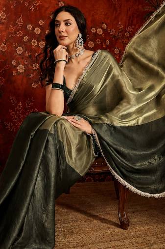 Olive tissue satin embellished saree with unstitched blouse piece.
