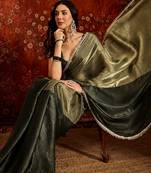 Olive tissue satin embellished saree with unstitched blouse piece.