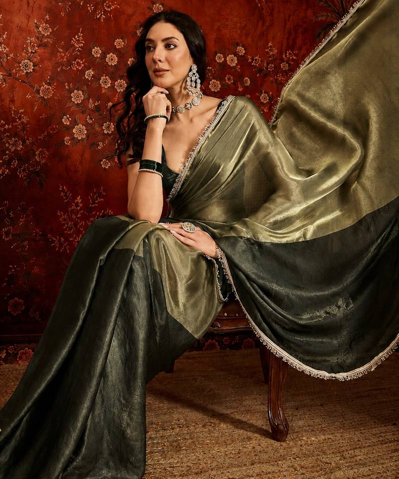 Olive tissue satin embellished saree with unstitched blouse piece.