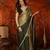 Olive tissue satin embellished saree with unstitched blouse piece.