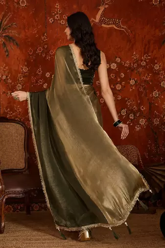 Olive tissue satin embellished saree with unstitched blouse piece.