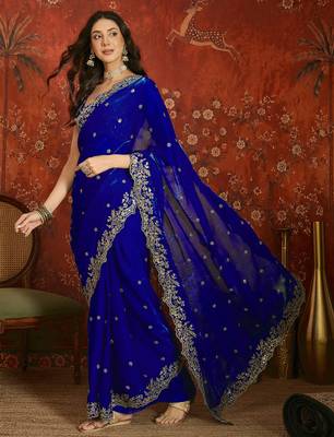 Blue tissue satin embroidered saree with unstitched blouse piece. 4