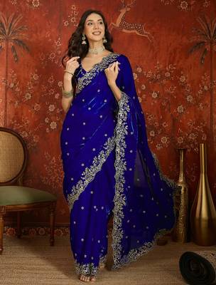 Blue tissue satin embroidered saree with unstitched blouse piece. 5