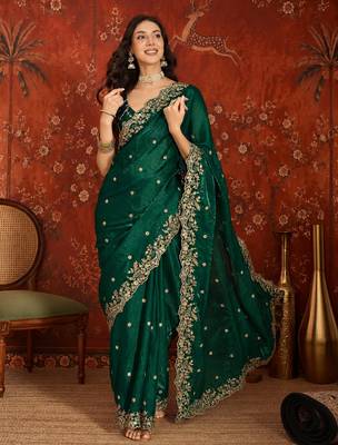 Bottle green tissue satin embroidered saree with unstitched blouse piece. 1