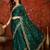 Bottle green tissue satin embroidered saree with unstitched blouse piece.