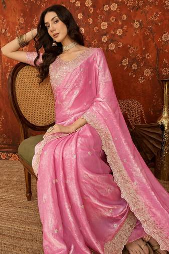 Pink tissue satin embroidered saree with unstitched blouse piece.