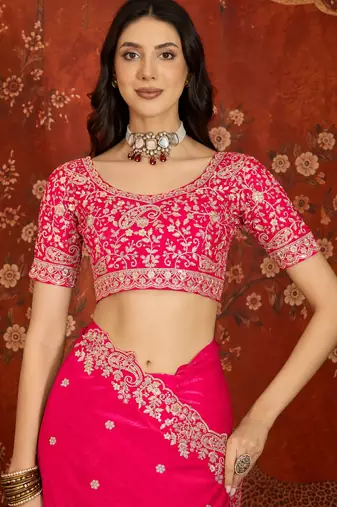 Rani tissue satin embroidered saree with unstitched blouse piece.