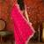 Rani tissue satin embroidered saree with unstitched blouse piece.