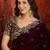 Wine tissue satin embroidered saree with unstitched blouse piece.