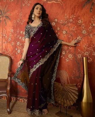 Wine tissue satin embroidered saree with unstitched blouse piece. 1