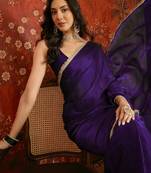 Purple tissue satin embrellished saree with unstitched blouse piece.