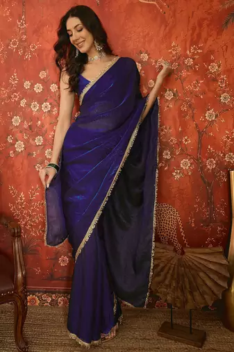 Purple tissue satin embrellished saree with unstitched blouse piece.