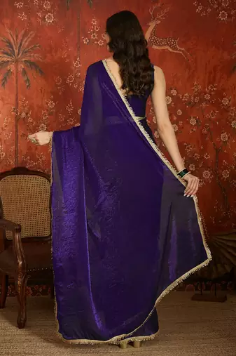 Purple tissue satin embrellished saree with unstitched blouse piece.