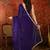 Purple tissue satin embrellished saree with unstitched blouse piece.