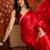 Red tissue satin embrellished saree with unstitched blouse piece.