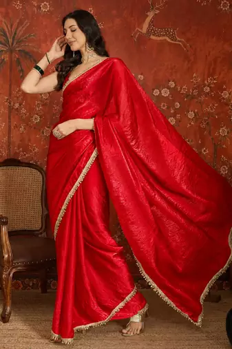 Red tissue satin embrellished saree with unstitched blouse piece.