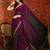 Wine tissue satin embrellished saree with unstitched blouse piece.