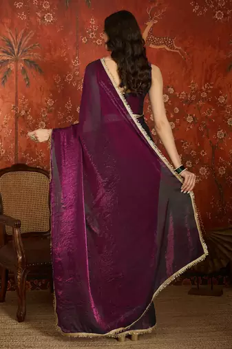 Wine tissue satin embrellished saree with unstitched blouse piece.