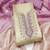  beige & contrast embroidered shimmer unstitched dress material with mirror work