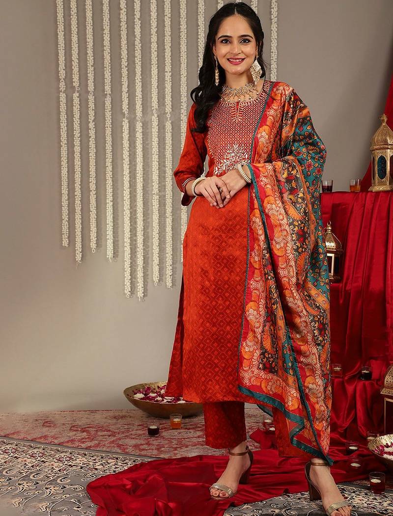 Orange floral embroidered art silk kurta trouser dupatta set