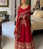 Red bridal anarkali suit with heavy embroidered dupatta and golden border