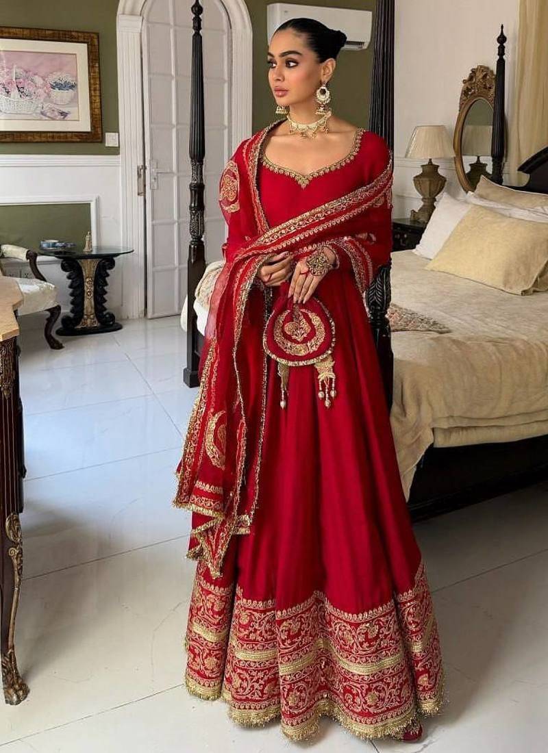 Red bridal anarkali suit with heavy embroidered dupatta and golden border