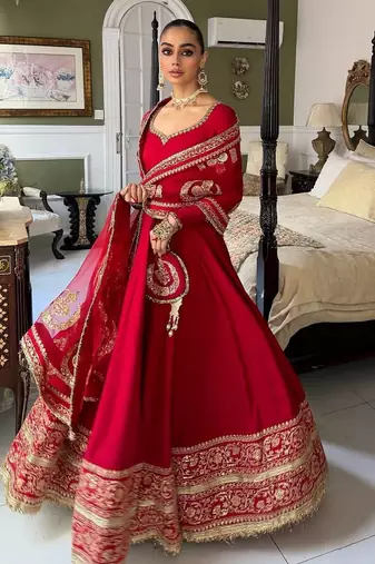 Red bridal anarkali suit with heavy embroidered dupatta and golden border