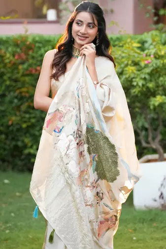 uma pure tissue viscose with zari weaving around borders & pallu radha rani art work with thread around pallu
