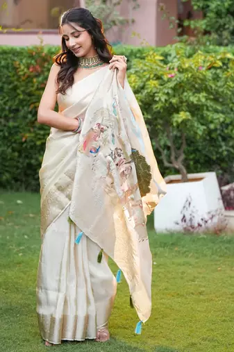 uma pure tissue viscose with zari weaving around borders & pallu radha rani art work with thread around pallu