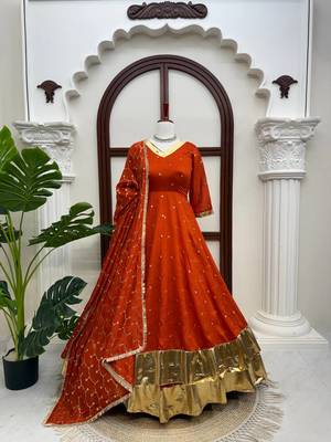 Rust orange silk anarkali suit with golden border and embroidered dupatta 3