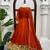 Rust orange silk anarkali suit with golden border and embroidered dupatta